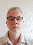 Portrait of Kevin Maycock, trustee of Penk Valley Academy Trust, with extensive experience in education and leadership roles.